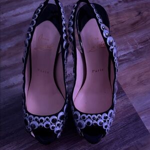 Christian Louboutin Limited Edition Black Heels with Googly Eye Accents.